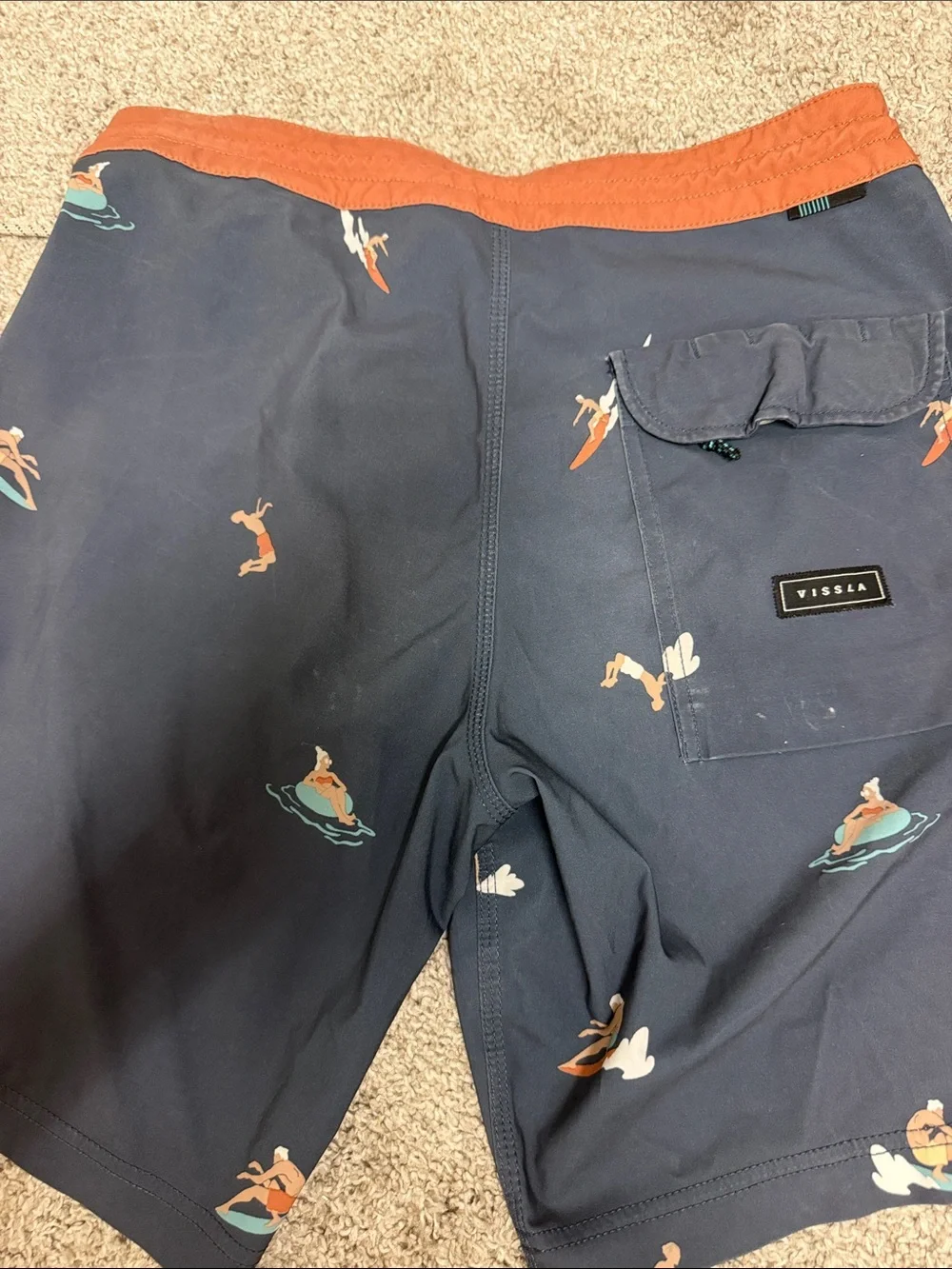 VISSLA Navy Swim Shorts with Rust Waistband and Surf Print